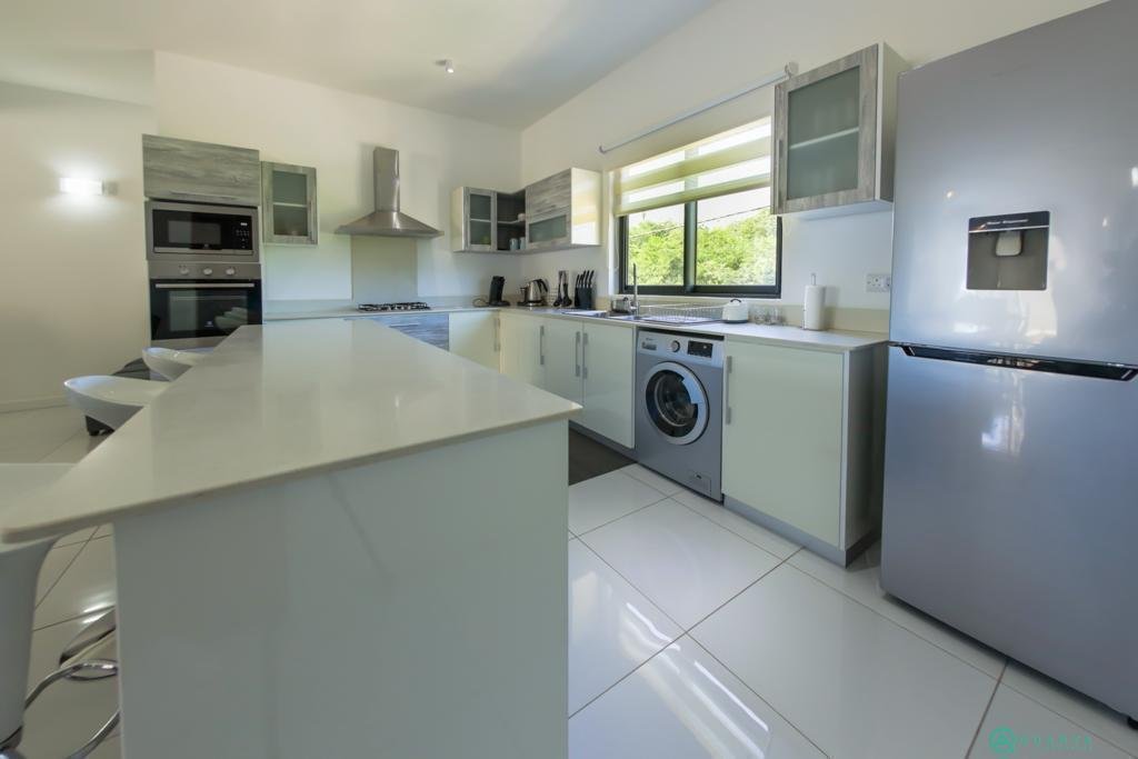 WhatsApp Image 2026-08-17 at 10.23.10 AM (1) Beachfront 3-Bedroom Apartment for Rent in Flic en Flac, Mauritius – Luxury Coastal Living